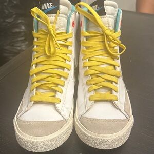 Nike Yellow and White High-Top Sneakers with Canvas Material